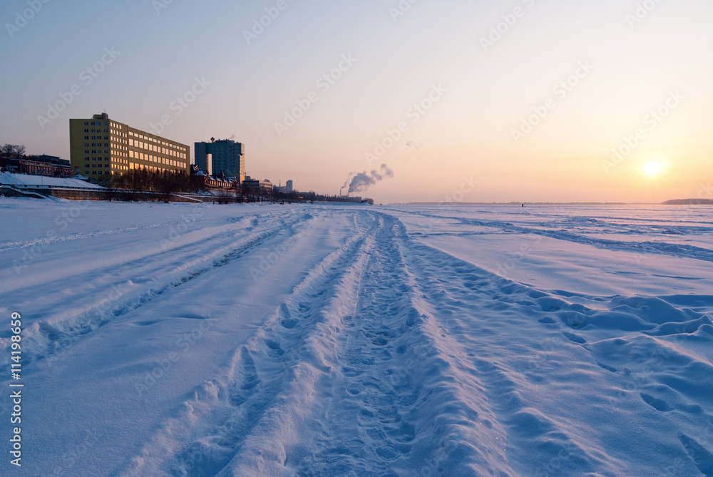 Volga river bank in the city of Samara in the winter at sunset