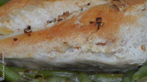 Wallpaper Mural Fried chicken breast with green beans and spices, in boiling oil, close-up Torontodigital.ca