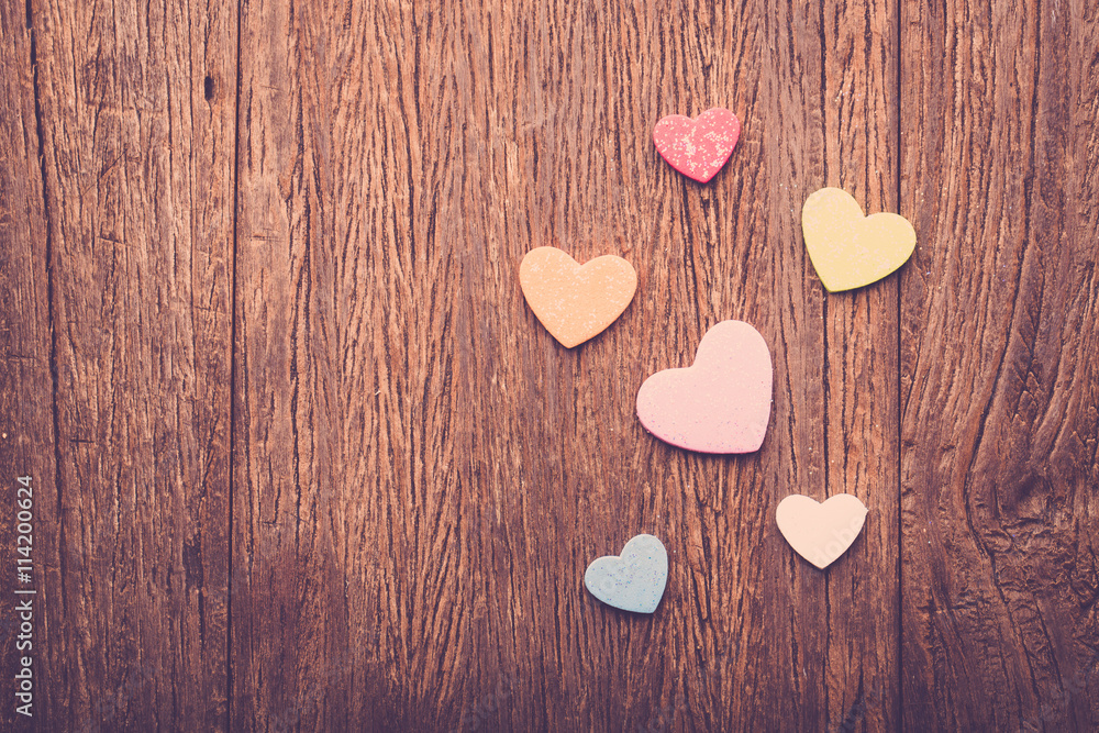 Valentine hearts on grunge wood background Valentine hearts on grunge wood background