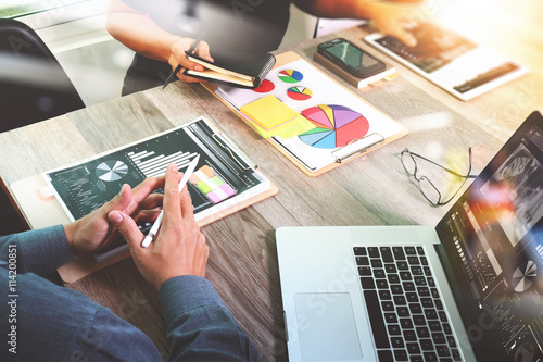 Businessman making presentation with his colleagues and business