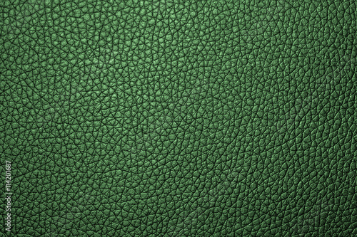 Closeup green leather texture for design. Leather background with copy space for text or image.