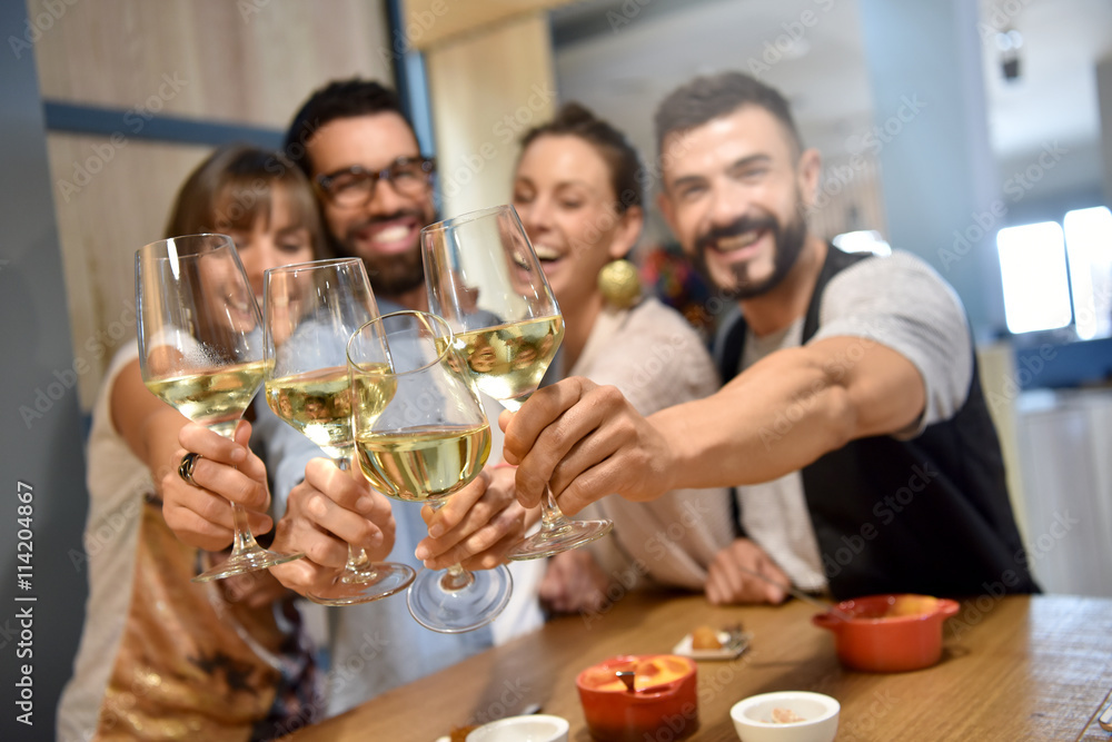 Portrait of friends in a bar drinking wine Portrait of friends in a bar drinking wine