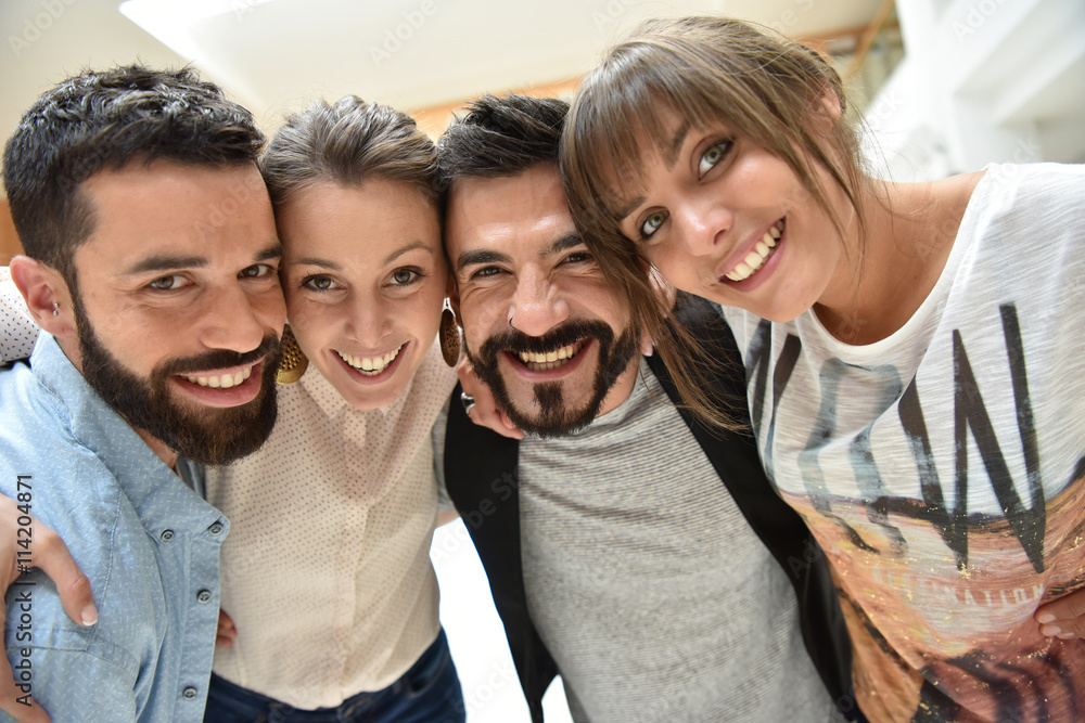 Happy group of friends looking at camera Happy group of friends looking at camera