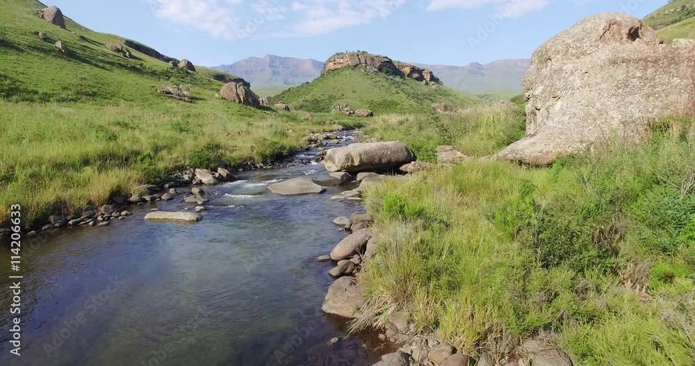 4K aerial view of a river in the Drakensburg mountains 4K aerial view of a river in the Drakensburg mountains