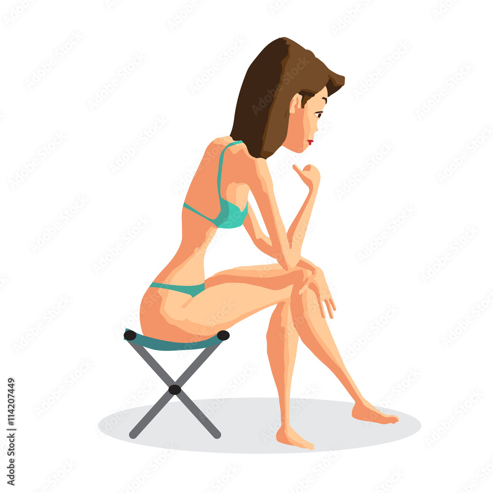 Slender brunette in a green bikini sitting on a folding chair on