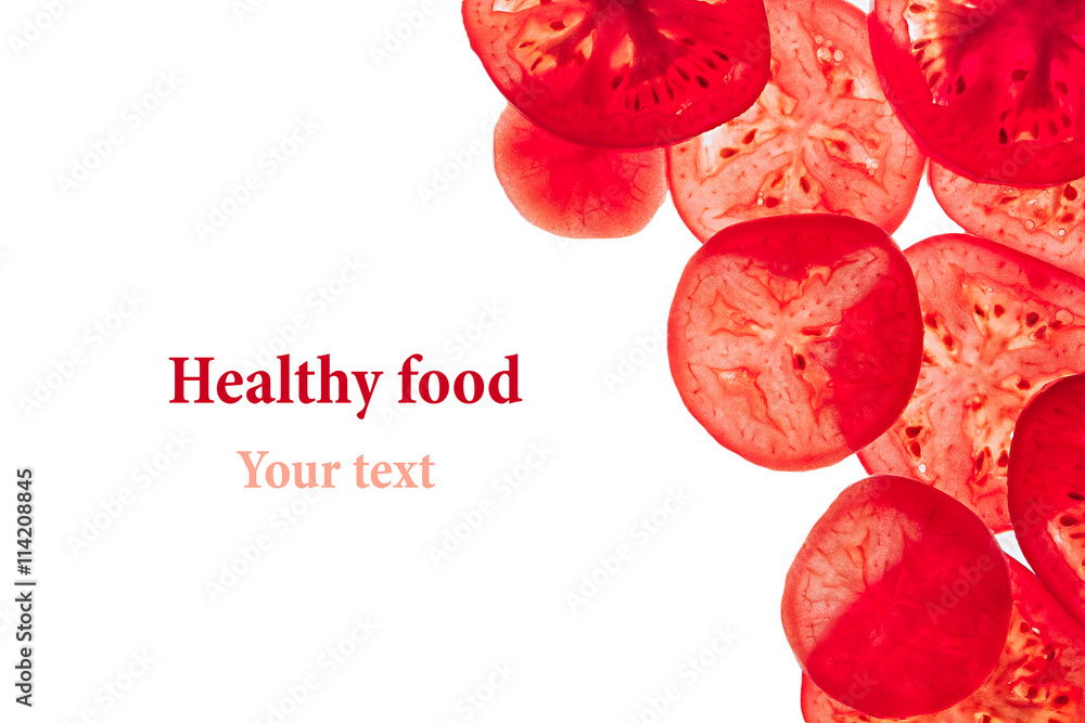 Fototapeta premium Decorative frame of slices of tomatoes on a white background. Isolated. Tomatoes sliced circles. Frame, border from vegetables. Food background.