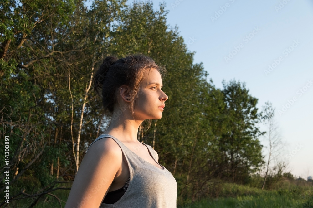 beautiful young girl on the background of nature beautiful young girl on the background of nature
