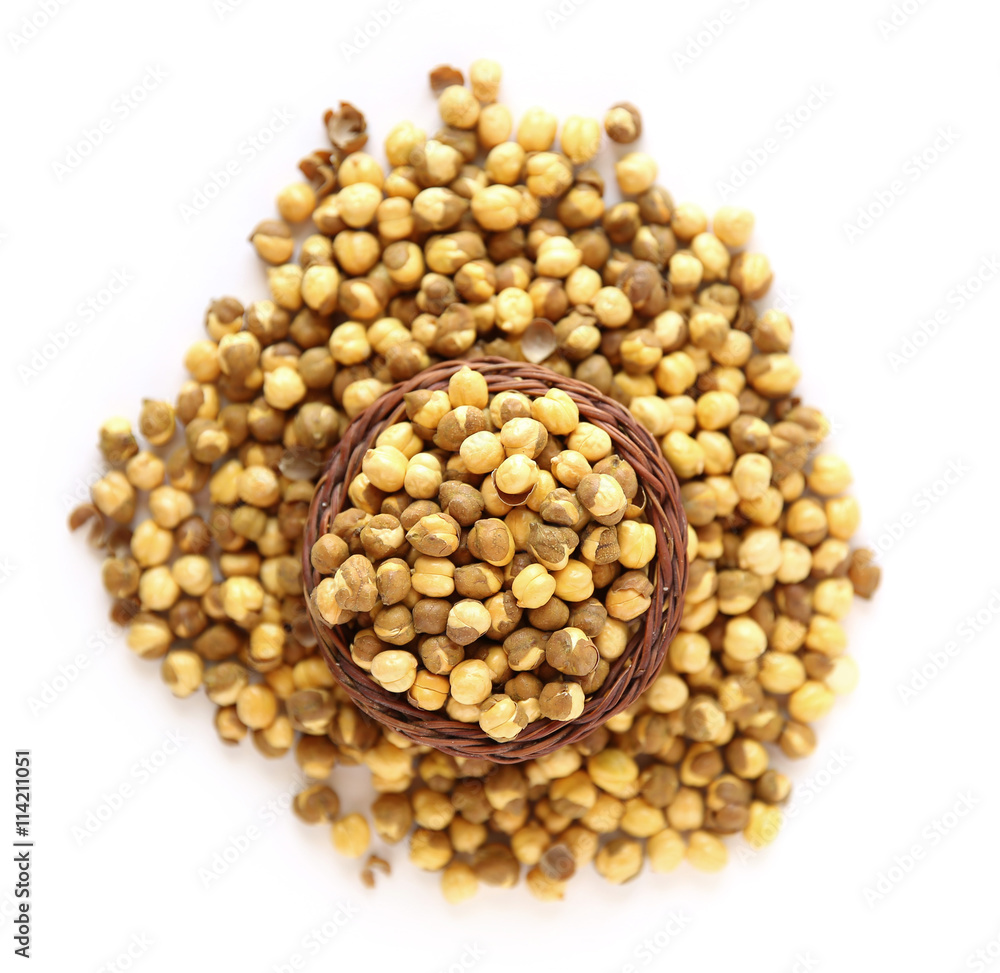 Chickpeas, in wooden basket, beans isolated on a white backgroun Chickpeas, in wooden basket, beans isolated on a white backgroun