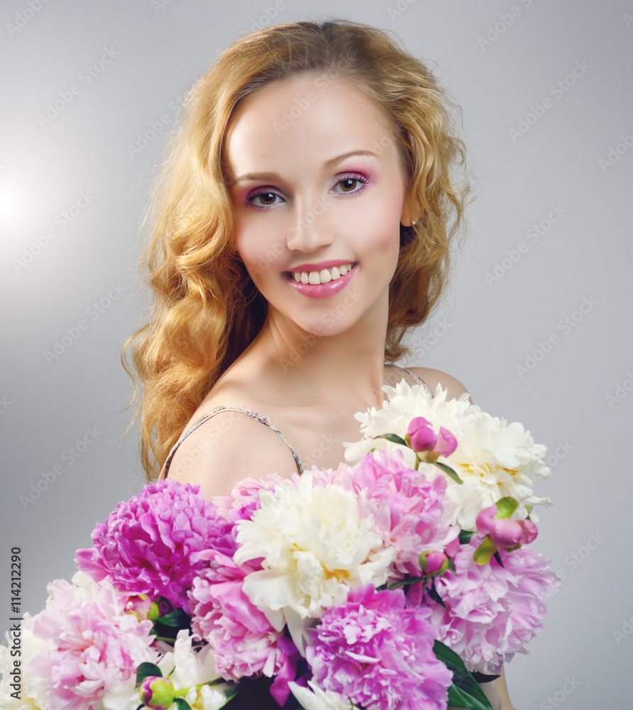 Beautiful girl with peony flowers Beautiful girl with peony flowers