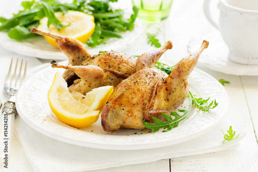 Delicious fried quail with herbs and greens. Delicious fried quail with herbs and greens.