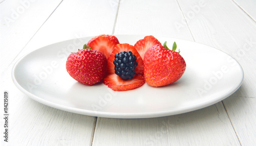 a pile of blackberries and strawbeeries