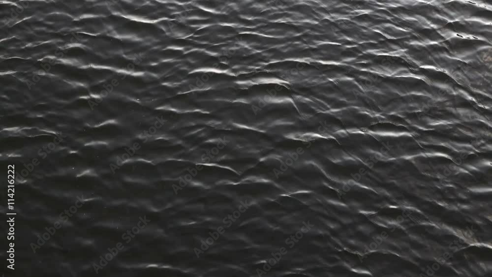 Amazing close up nature texture of running ripple on the water. Cinematic moving background with meditative and hypnotic effect. Amazing close up nature texture of running ripple on the water. Cinematic moving background with meditative and hypnotic effect.
