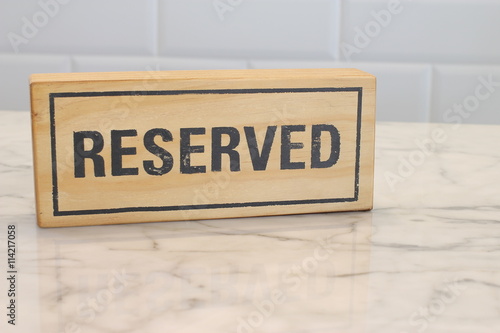 Restaurant reserved table sign on table