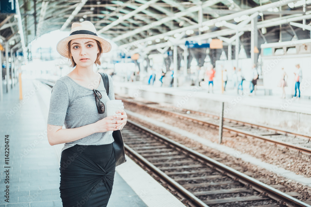 Woman wondering if her train will arrive