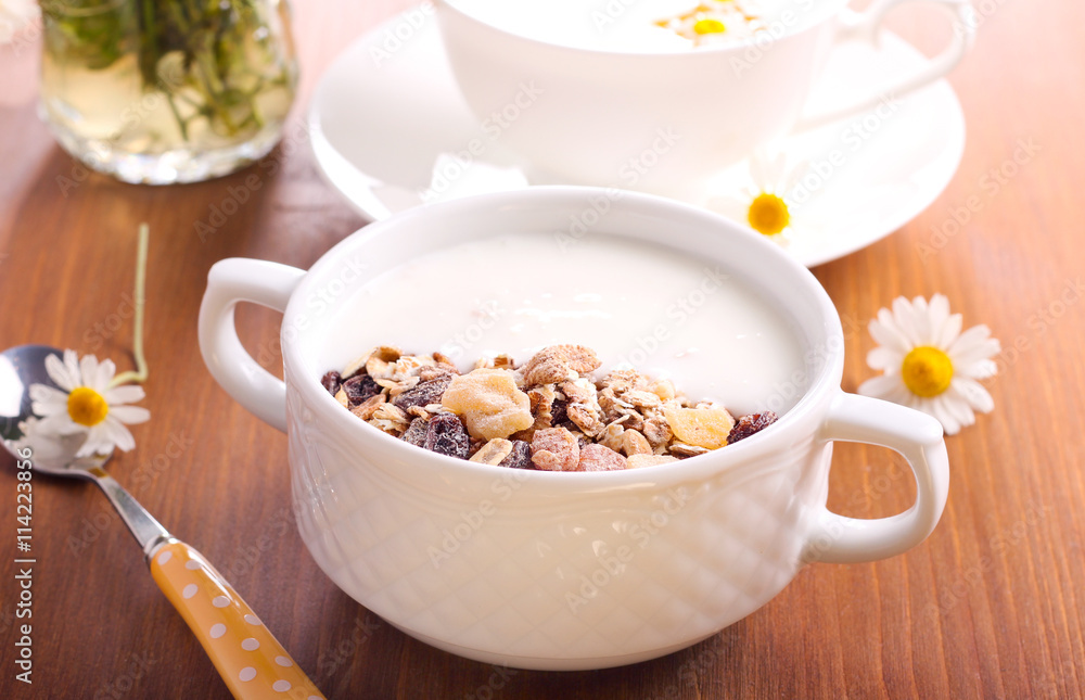 Muesli mix with yogurt in a bowl