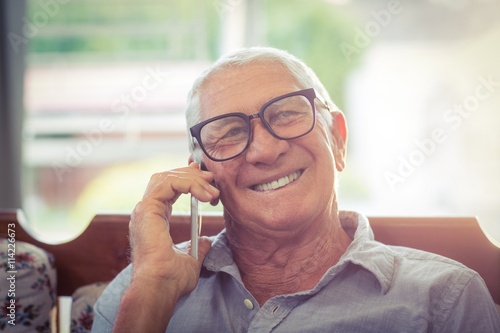 Senior man talking on mobile phone