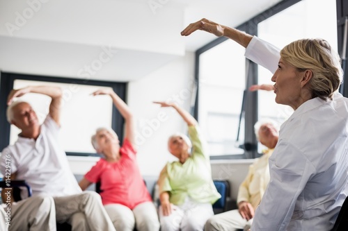 Seniors doing exercises