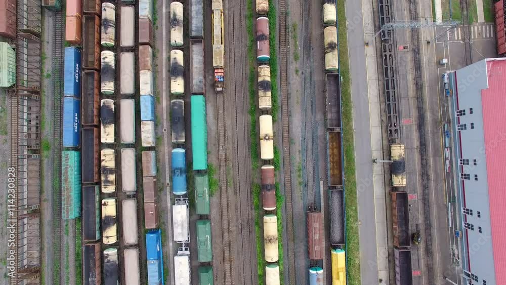 Railway yard with a lot of railway lines and freight trains, Rail freight marshalling yard, Russian Railways. Railway yard with a lot of railway lines and freight trains, Rail freight marshalling yard, Russian Railways.