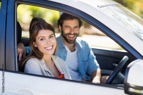 Happy couple sitting in a car © WavebreakMediaMicro