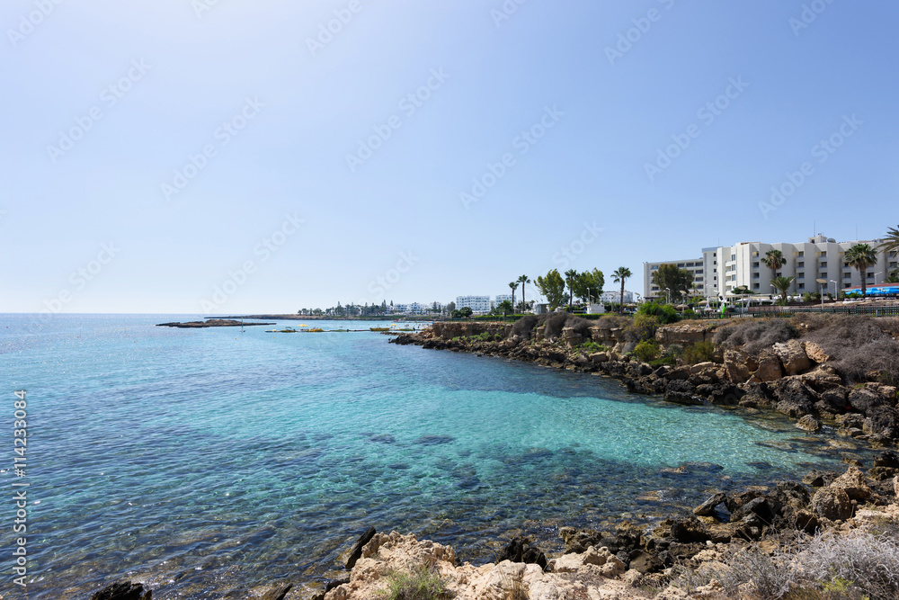 Fototapeta premium Photo of sea in protaras, cyprus island with rocks and hotels.