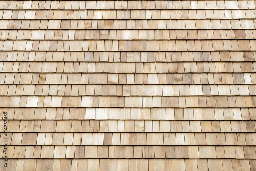 Several wood cedar shingles for siding or roofs. Several wood cedar shingles for siding or roofs.
