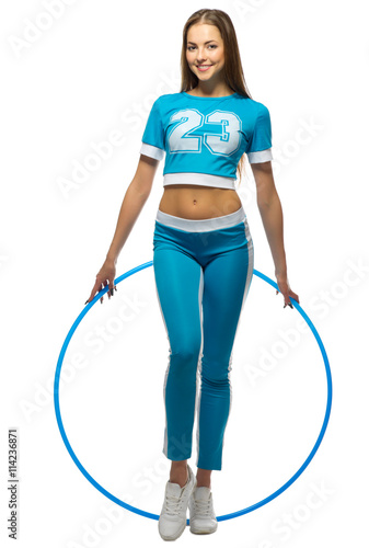 Young sporty girl with plastic hoop