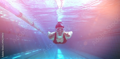 Canvas Print Athletic swimmer training on her own