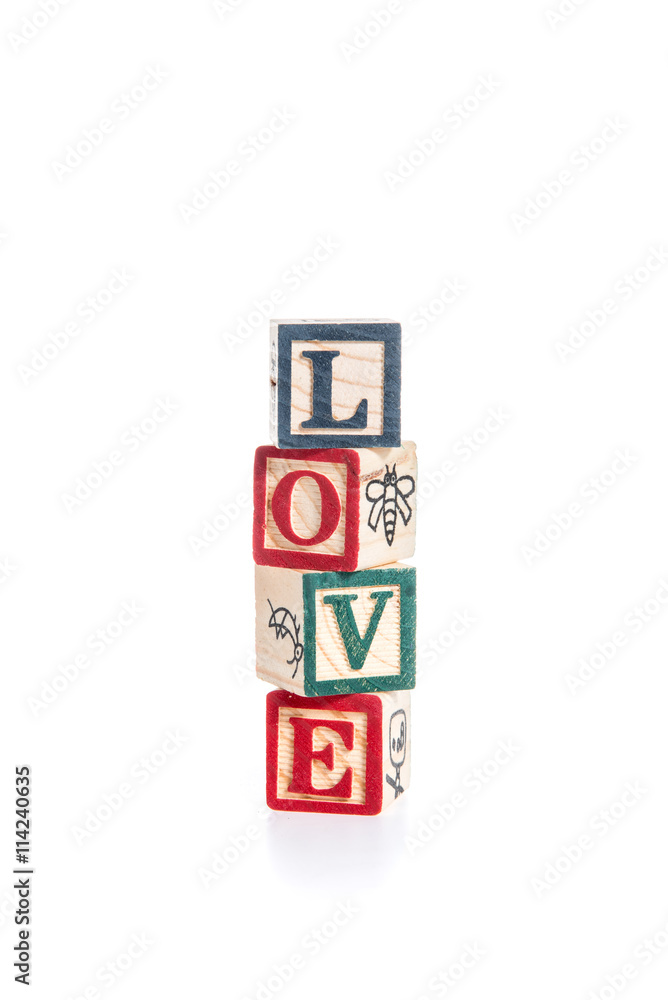 photo of a alphabet blocks spelling LOVE isolate on white backgr photo of a alphabet blocks spelling LOVE isolate on white backgr