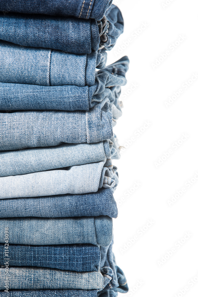 stack of jeans on white background stack of jeans on white background