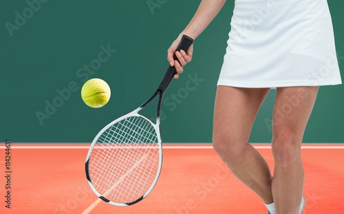 Composite image of athlete playing tennis with a racket  © vectorfusionart