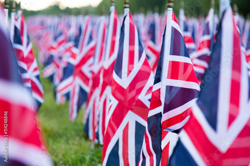 British United Kingdom UK Flags in a row with front focus and the further away symbols blurry with bokeh. The flags were set up on Memorial Day in DC.