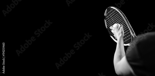 Tennis player holding a racquet ready to serve  © vectorfusionart
