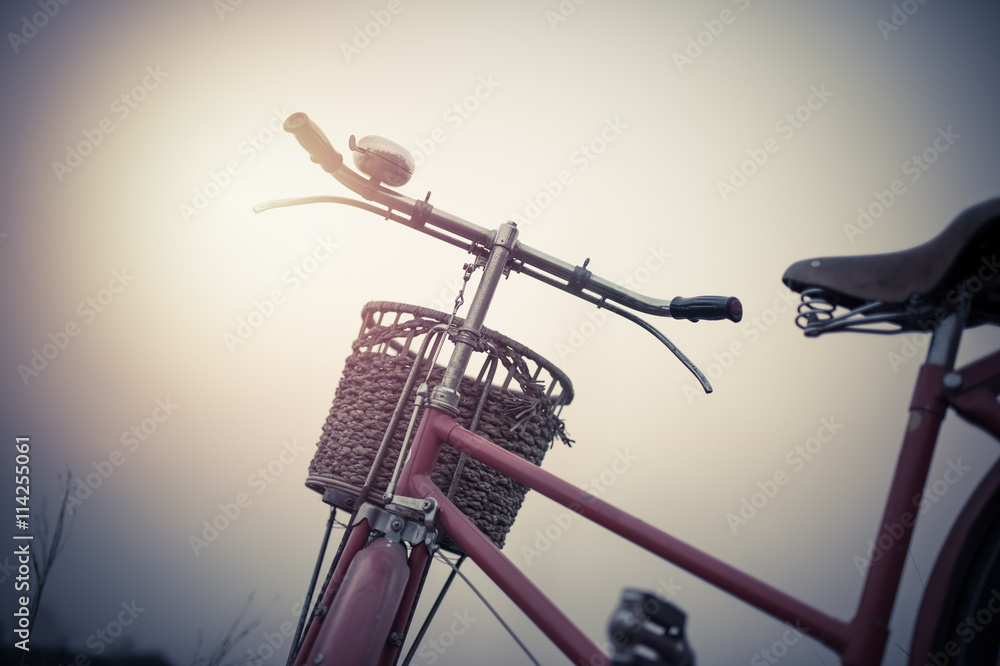 beautiful landscape image Vintage red Bicycle with Basket  at su