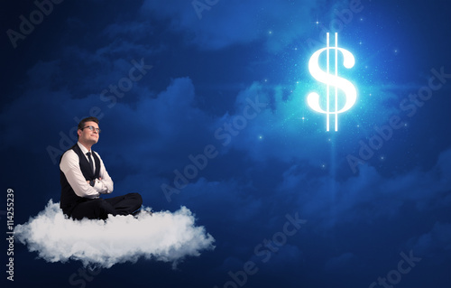 Man sitting on a cloud dreaming of money