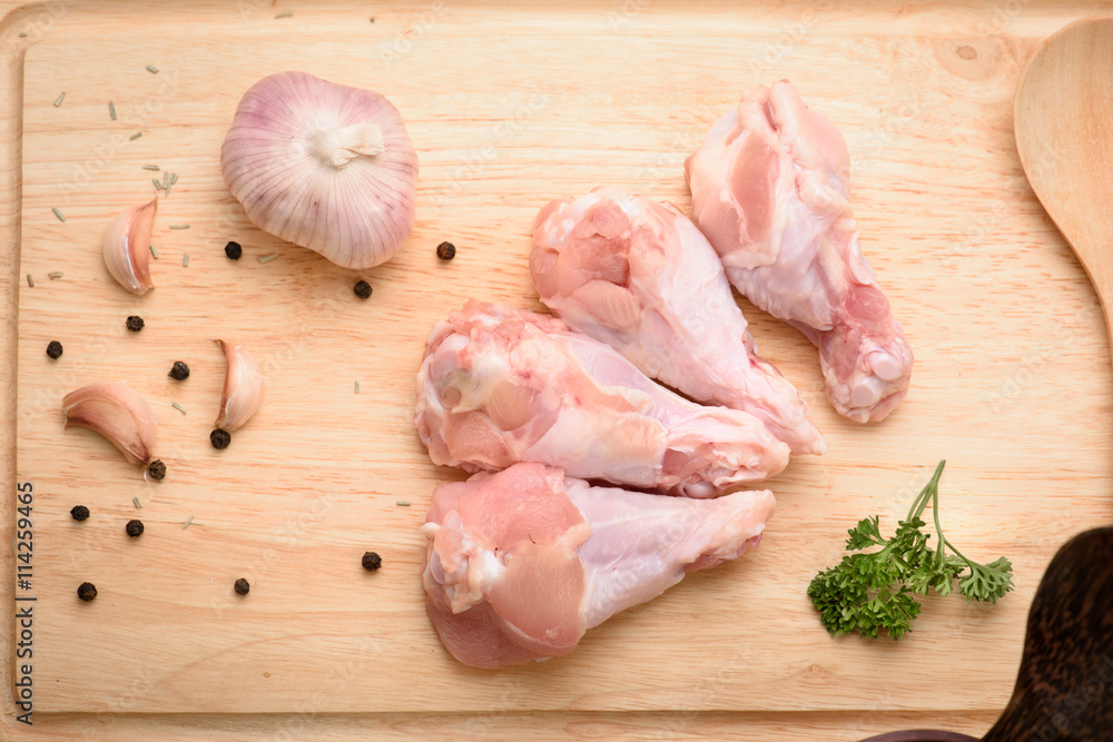 Chicken wings (wingstick) uncooked with garlic black pepper and Chicken wings (wingstick) uncooked with garlic black pepper and