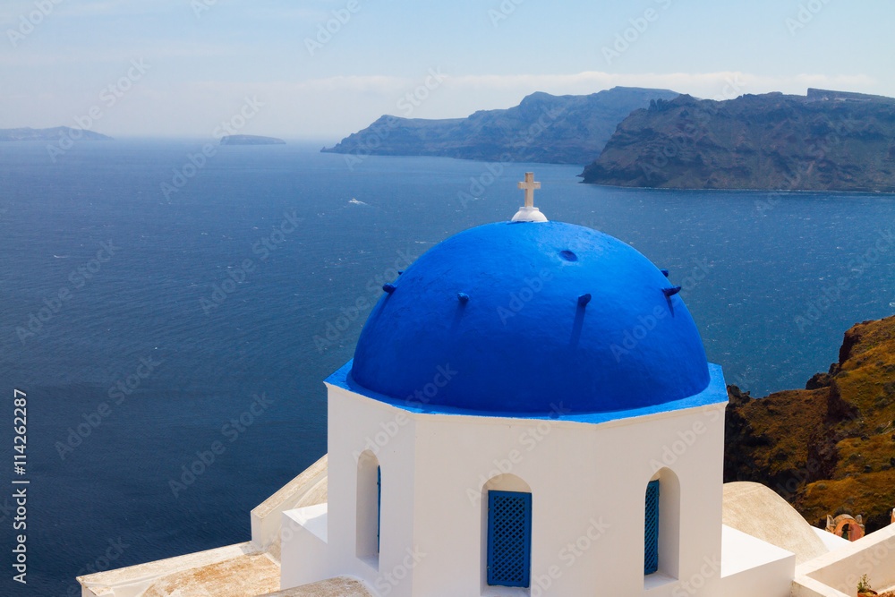 Fototapeta premium view of caldera with blue domes, Santorini