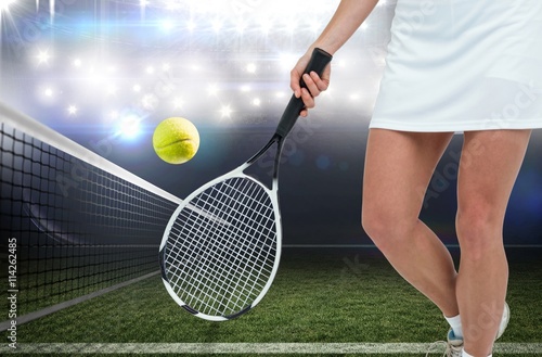 Composite image of athlete playing tennis with a racket 