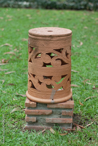 Baked Clay Lamp In The Garden