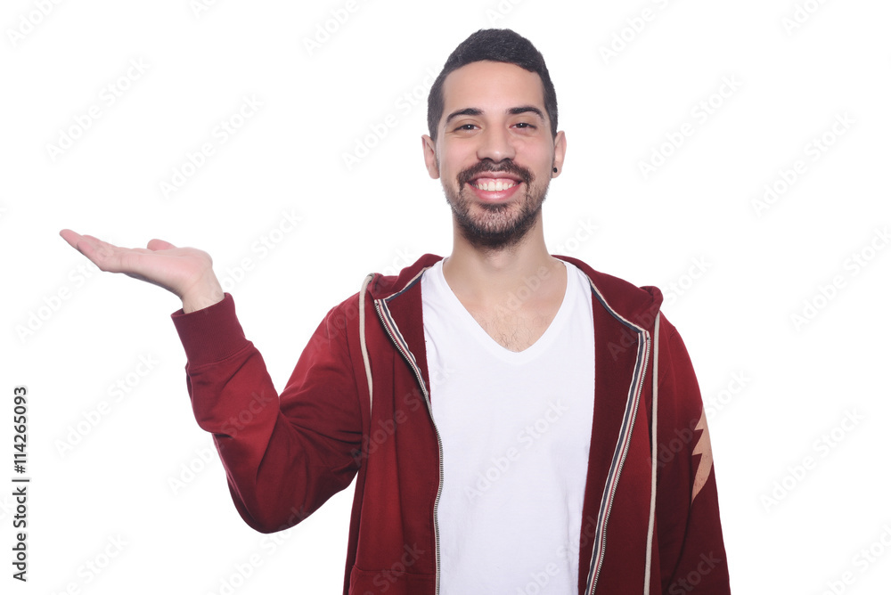 Young latin man holding something on the palm. Young latin man holding something on the palm.