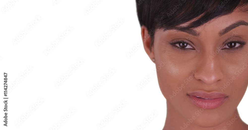 Close up of Beautiful woman with small smile on her face on whit Close up of Beautiful woman with small smile on her face on whit