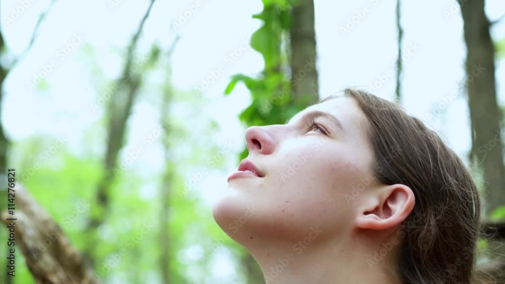 Girl looking up into sky while reflecting mentally on the situation.
Girl looking up into sky while reflecting mentally on the situation.