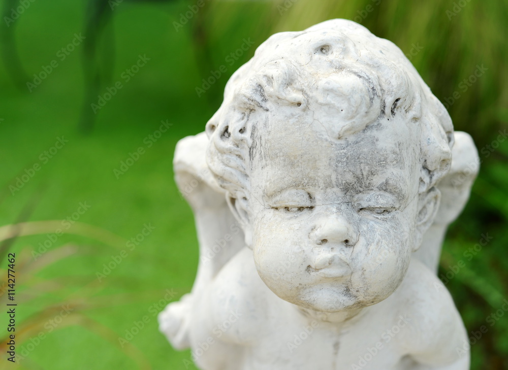 cupid face sculpture stone