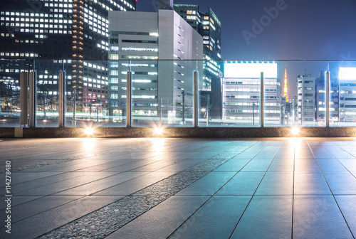 Photography empty floor with modern office buildings in downtown of tokyo at