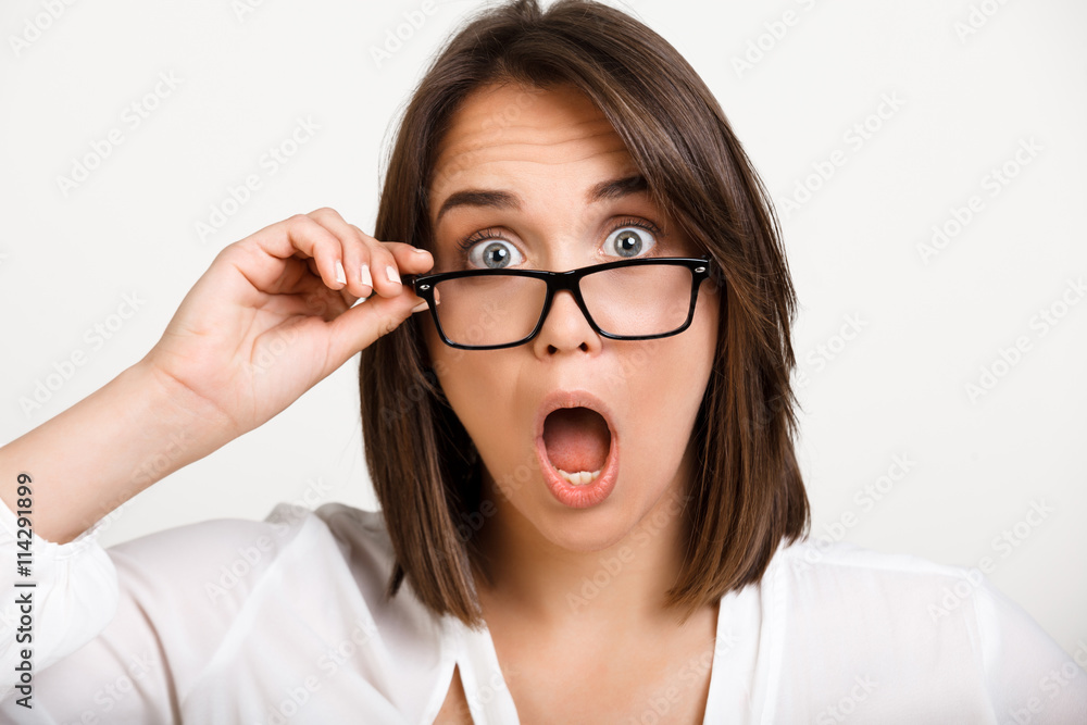 Portrait of girl playing ape over white background. Portrait of girl playing ape over white background.