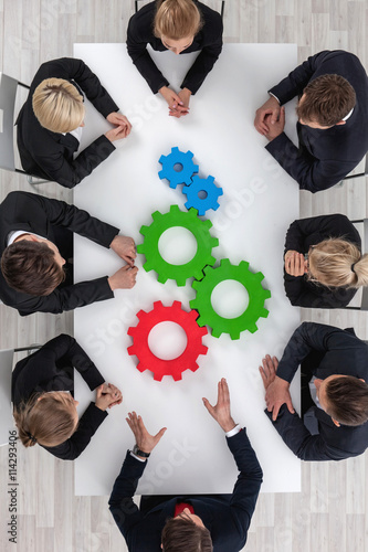 Teamwork with cogs of business