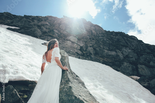 The bride in mountains. Wedding