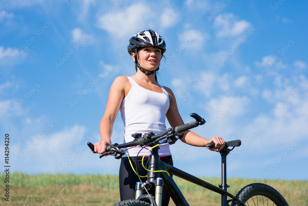 Happy Young Woman riding bicycle outside Happy Young Woman riding bicycle outside