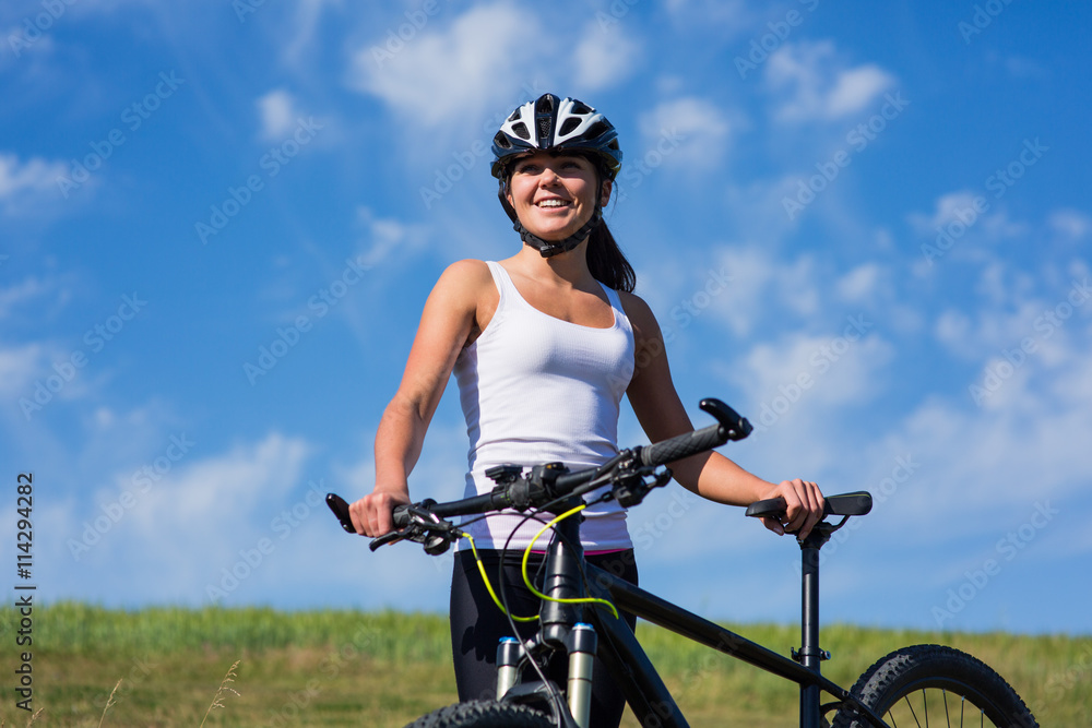 Happy Young Woman riding bicycle outside Happy Young Woman riding bicycle outside