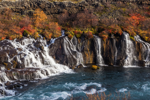 Colorful hraunfossar waterfall, Iceland. Wild autumn landscape © michalsanca