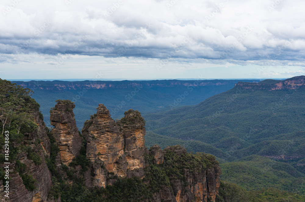 Three Sisters rock formation viewed from Echo Point lookout. Iconic Australian tourist attraction in Blue Mountains National Park, NSW, Australia